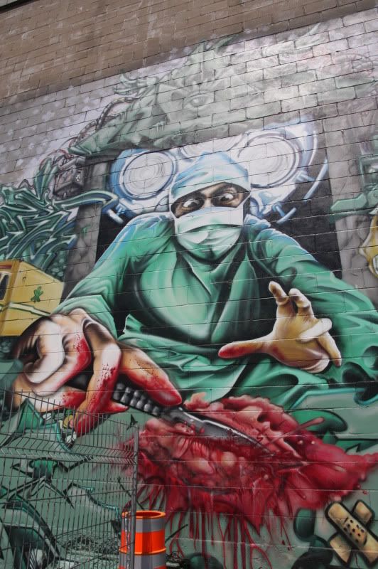 IMAGE: http://i22.photobucket.com/albums/b313/SRT101/Street%20Art/IMG_5976.jpg