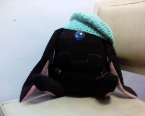 mokona wearing my puffy slouchy crocheted hat - top view