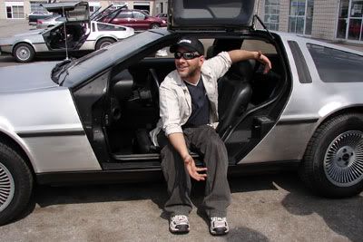 Even with the sun's radioactive UV rays destroying our skin, no one can resist smiling around a DeLorean.