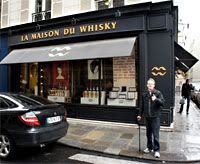 Dorking it up outside La Maison du Whisky.
