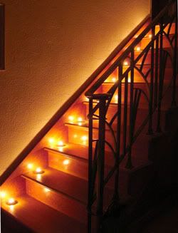 Stairs, made of wood, illuminated by fire. Good thinking.