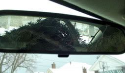 This pine-scented air-freshener was too big for the mirror.