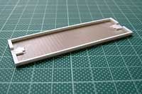 Build an HOn30 flatcar: Coupler mounting pad/end sills (photograph)