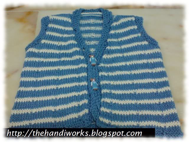 blue and white striped hand knit baby vest