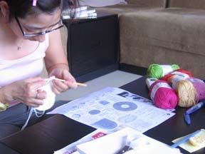 singaporean learning crochet hello kitty toy