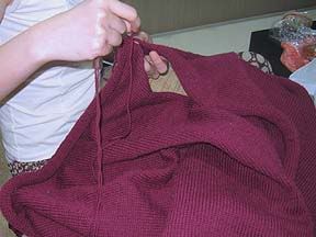 sewing and joining man sweater