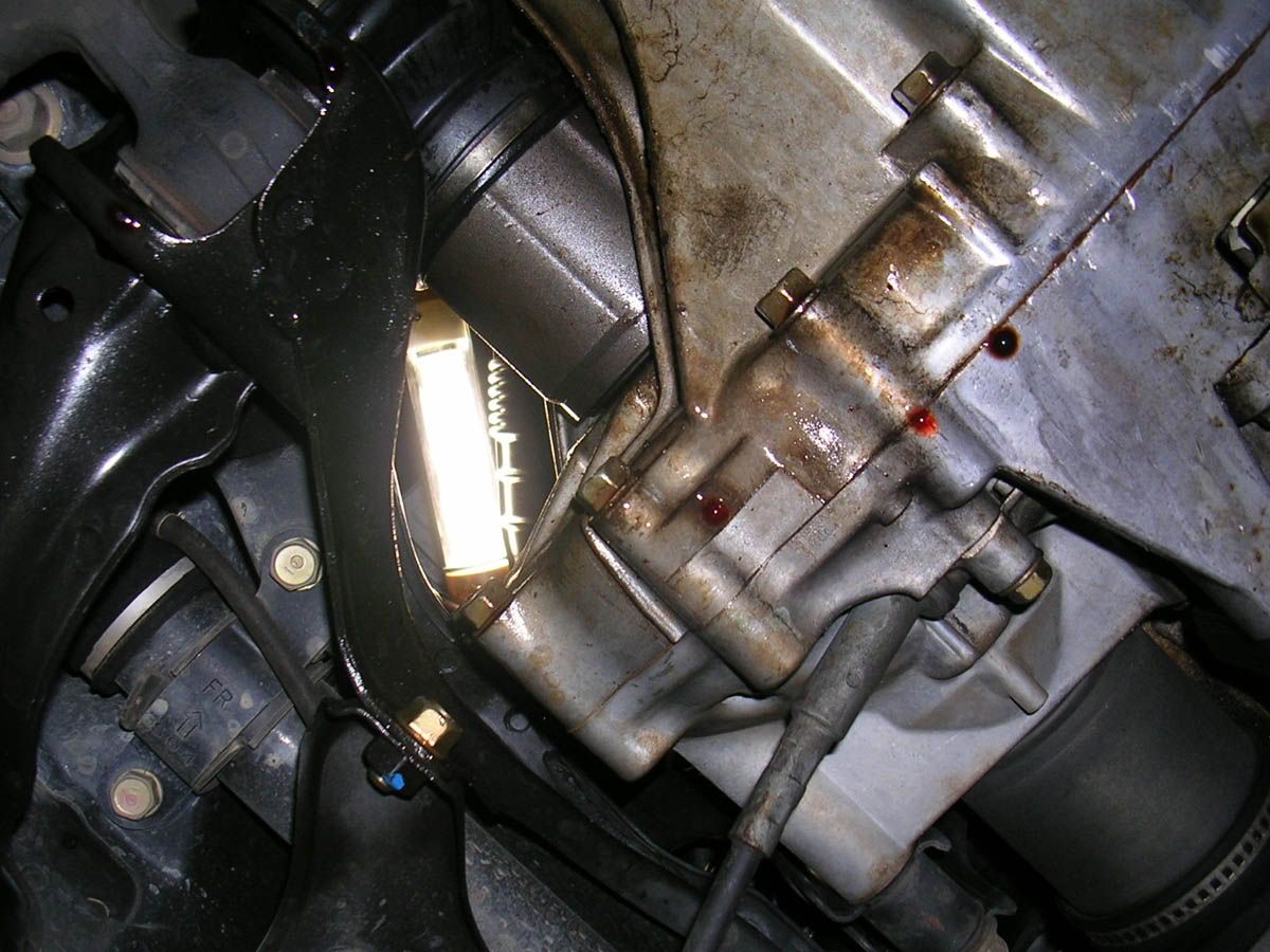 Oil leak between engine and transmission honda