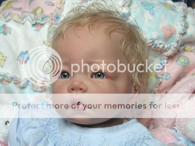 The pictures below are of a Elly Knoops Luca Baby Reborned. This 